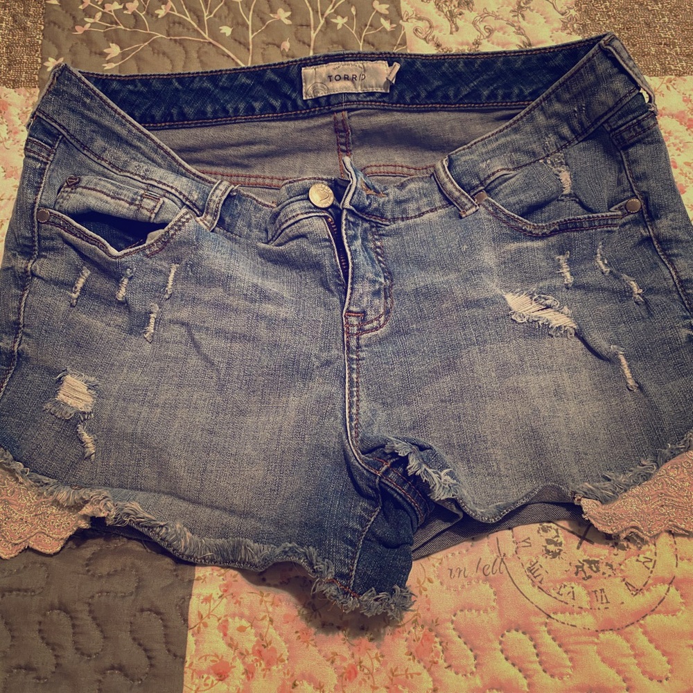 Torrid distressed shorts with lace